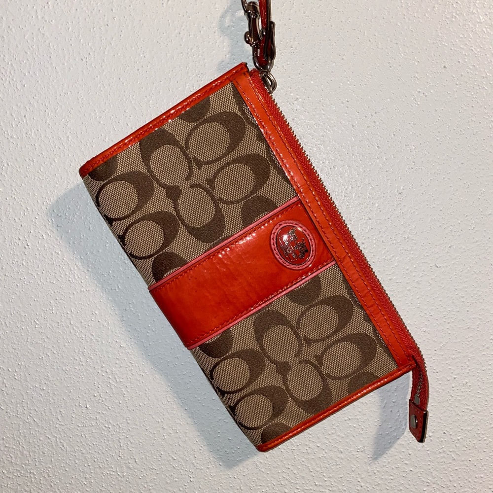 Coral leather Coach wristlet